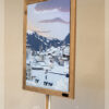 Tableau Chamonix en hiver, et son cadre en vieux bois de l'artiste Nicholas PERILLI en vue de côté.